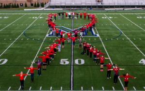 Contributed photo: Members of the Colleges Against Cancer club gathered at Tullio Field to capture the photograph appearing on the holiday cards.